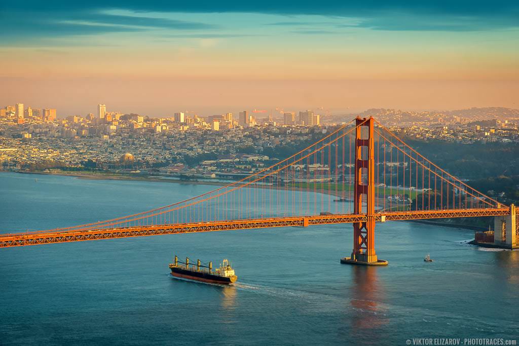 Golden Gate bridge, shot from the mountains at golden hour defore sunset