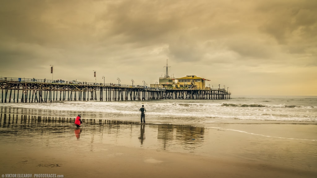 The photo of Santa Monica pier shot on cloudy winter day 